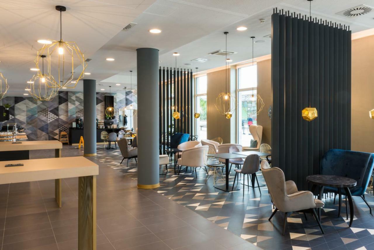 Holiday Inn - The Niu, Ridge Halle Central Station By Ihg Экстерьер фото